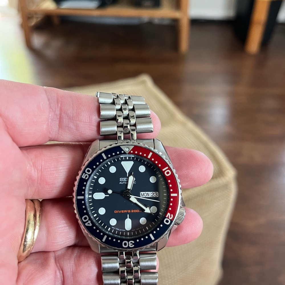 Seiko Black and Red Dive Watch with Luminous Markers